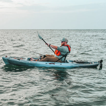 Vibe Sea Ghost 110 Fishing Kayak gliding on calm river waters