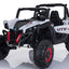 MotoTec Mini Moto UTV 4x4 12v in white driving on grass with child at the wheel

