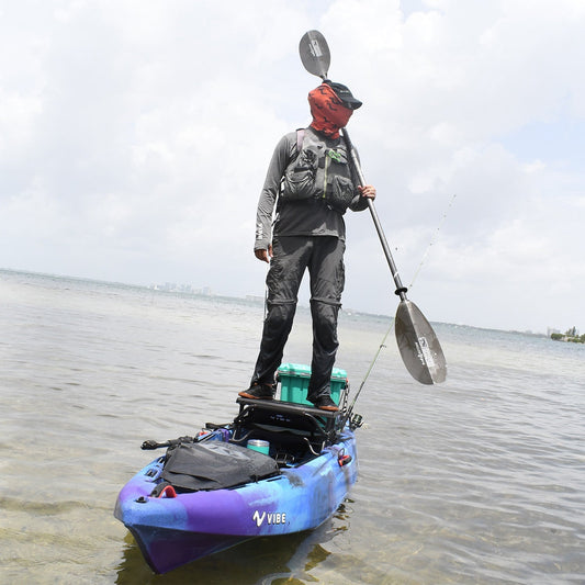 Vibe Yellowfin 120 kayak in Galaxy color on calm lake